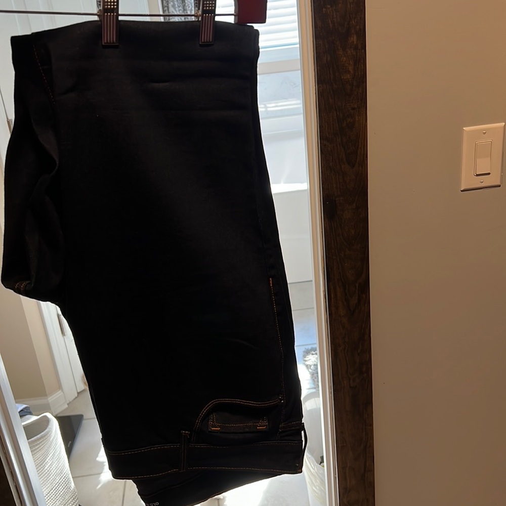 Dark wash jeans. Never worn.